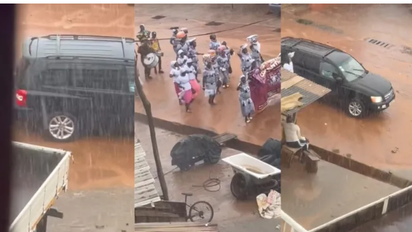 Reactions as Pastor and Wife Drive in Luxury Car as Congregation Walk in Rain: "Who Did This To Africa?"